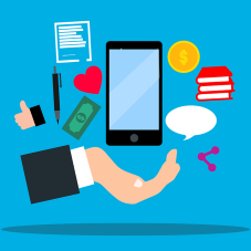 Hand mit Handy umgeben von Apps